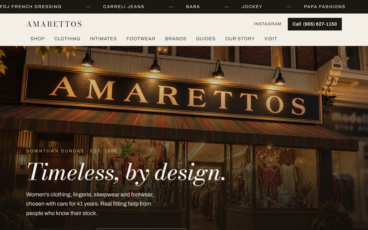 Amarettos homepage after the rebuild: the Dundas storefront at dusk under the headline Timeless, by design, with a brands strip, department navigation and a call button